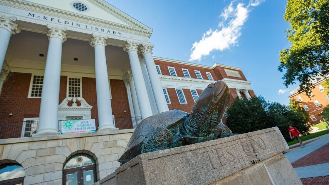 Bronze status of Testudo turtle in front of McKeldin Library
